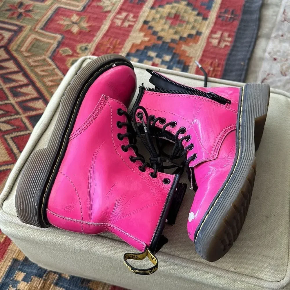 Dr. Martens - pink lace-up boots. For your punk rock girrrrrl.